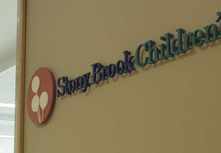 Stony Brook Children's Hospital logo on a lobby wall