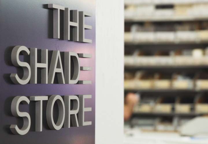 The Shade Store sign in an office