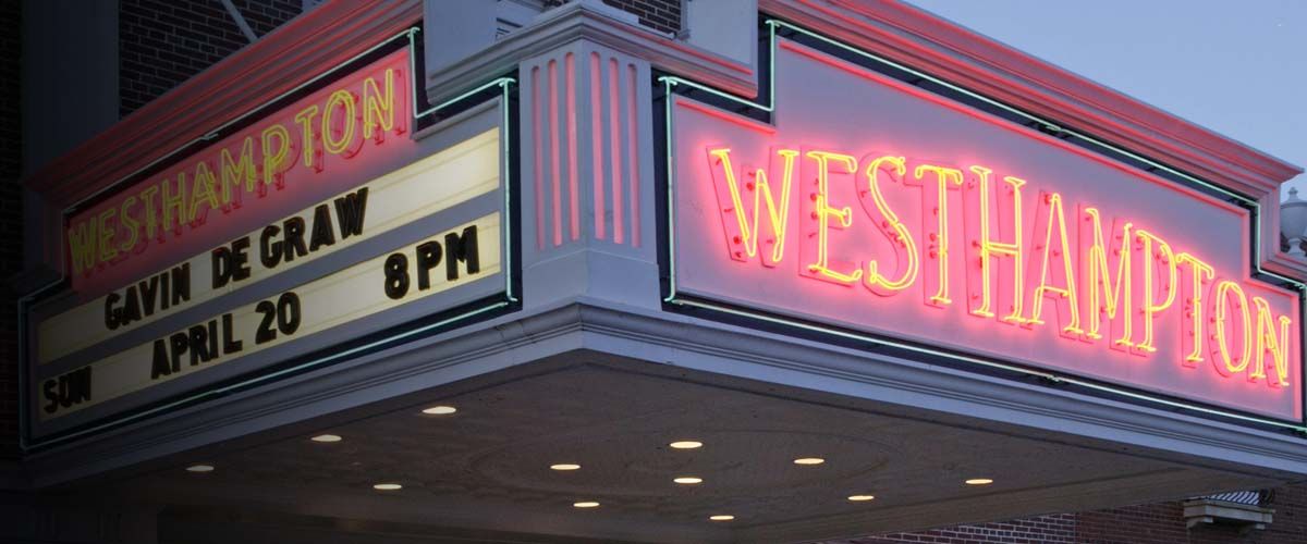 theater marquis for Westhampton Beach Performing Arts Center light up with neon lights